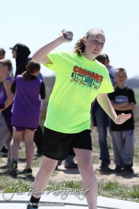 Competitors take part in the 7th Grade Girls Shot Put at the Oiler Relays at Barton Community College in Great Bend, Kansas on April 4, 2013. (Photo: Joey Bahr, www.joeybahr.com)