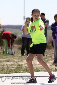 Competitors take part in the 7th Grade Girls Shot Put at the Oiler Relays at Barton Community College in Great Bend, Kansas on April 4, 2013. (Photo: Joey Bahr, www.joeybahr.com)