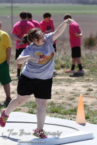 Competitors take part in the 7th Grade Girls Shot Put at the Oiler Relays at Barton Community College in Great Bend, Kansas on April 4, 2013. (Photo: Joey Bahr, www.joeybahr.com)