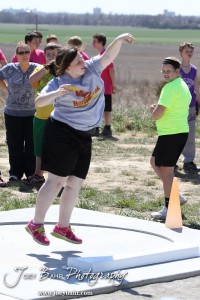 Competitors take part in the 7th Grade Girls Shot Put at the Oiler Relays at Barton Community College in Great Bend, Kansas on April 4, 2013. (Photo: Joey Bahr, www.joeybahr.com)