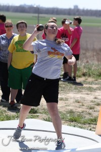 Competitors take part in the 7th Grade Girls Shot Put at the Oiler Relays at Barton Community College in Great Bend, Kansas on April 4, 2013. (Photo: Joey Bahr, www.joeybahr.com)