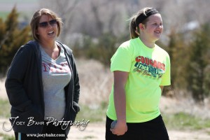 Competitors take part in the 7th Grade Girls Shot Put