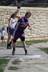 A Weskan competitor throws the shot put during the 2013 KSHSAA Class 1A Regional Track and Field competition at Lewis Field on the campus of Fort Hays State University in Hays, Kansas on May 17, 2013. (Photo: Joey Bahr, www.joeybahr.com)