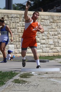 Sam Higgason of Otis-Bison competes in the shot put during the 2013 KSHSAA Class 1A Regional Track and Field competition at Lewis Field on the campus of Fort Hays State University in Hays, Kansas on May 17, 2013. (Photo: Joey Bahr, www.joeybahr.com)