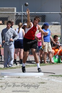 A Hoxie thrower competes in the shot put during the 2013 KSHSAA Class 1A Regional Track and Field competition at Lewis Field on the campus of Fort Hays State University in Hays, Kansas on May 17, 2013. (Photo: Joey Bahr, www.joeybahr.com)