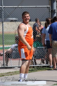 Sam Higgason of Otis-Bison reacts to a shot put throw during the 2013 KSHSAA Class 1A Regional Track and Field competition at Lewis Field on the campus of Fort Hays State University in Hays, Kansas on May 17, 2013. (Photo: Joey Bahr, www.joeybahr.com)