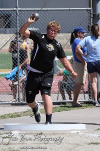 LaCrosse Leopard Cole Kershner throws the shot put in the preliminaries during the 2013 KSHSAA Class 1A Regional Track and Field competition at Lewis Field on the campus of Fort Hays State University in Hays, Kansas on May 17, 2013. (Photo: Joey Bahr, www.joeybahr.com)