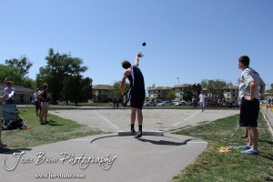 A Wheatland-Grinnell competitor throws the shot put during the 2013 KSHSAA Class 1A Regional Track and Field competition at Lewis Field on the campus of Fort Hays State University in Hays, Kansas on May 17, 2013. (Photo: Joey Bahr, www.joeybahr.com)