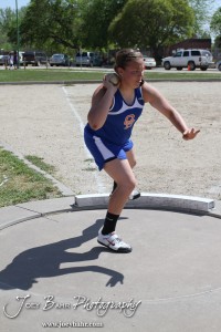 Otis-Bison's Megan Tammen throws the shot put during the 2013 KSHSAA Class 1A Regional Track and Field competition at Lewis Field on the campus of Fort Hays State University in Hays, Kansas on May 17, 2013. (Photo: Joey Bahr, www.joeybahr.com)