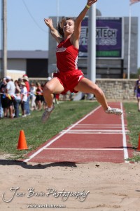 A Greeley County competitor flies through the air in the long jump during the 2013 KSHSAA Class 1A Regional Track and Field competition at Lewis Field on the campus of Fort Hays State University in Hays, Kansas on May 17, 2013. (Photo: Joey Bahr, www.joeybahr.com)