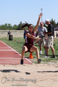 A competitor from Victoria prepares to land in the long jump during the 2013 KSHSAA Class 1A Regional Track and Field competition at Lewis Field on the campus of Fort Hays State University in Hays, Kansas on May 17, 2013. (Photo: Joey Bahr, www.joeybahr.com)