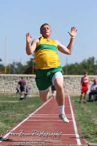 A St. Francis competitor takes off on a long jump attempt during the 2013 KSHSAA Class 1A Regional Track and Field competition at Lewis Field on the campus of Fort Hays State University in Hays, Kansas on May 17, 2013. (Photo: Joey Bahr, www.joeybahr.com)
