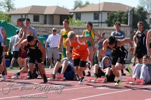 Otis-Bison's Jordan Hoffman launches from the start of the 100 Meter Dash Preliminaries during the 2013 KSHSAA Class 1A Regional Track and Field competition at Lewis Field on the campus of Fort Hays State University in Hays, Kansas on May 17, 2013. (Photo: Joey Bahr, www.joeybahr.com)