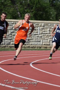 Otis-Bison's Jordan Hoffman turns the first corner in the 200 Meter Dash Preliminaries during the 2013 KSHSAA Class 1A Regional Track and Field competition at Lewis Field on the campus of Fort Hays State University in Hays, Kansas on May 17, 2013. (Photo: Joey Bahr, www.joeybahr.com)