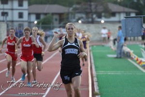 A Wheatland-Grinnell runner leads in the Girls 800 Meter Run during the 2013 KSHSAA Class 1A Regional Track and Field competition at Lewis Field on the campus of Fort Hays State University in Hays, Kansas on May 17, 2013. (Photo: Joey Bahr, www.joeybahr.com)