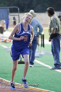 Fiona Conley of Otis-Bison competes in the Girls 3200 Meter Run during the 2013 KSHSAA Class 1A Regional Track and Field competition at Lewis Field on the campus of Fort Hays State University in Hays, Kansas on May 17, 2013. (Photo: Joey Bahr, www.joeybahr.com)