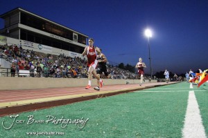 Competitors run down the straight in the Boys 3200 Meter Run during the 2013 KSHSAA Class 1A Regional Track and Field competition at Lewis Field on the campus of Fort Hays State University in Hays, Kansas on May 17, 2013. (Photo: Joey Bahr, www.joeybahr.com)