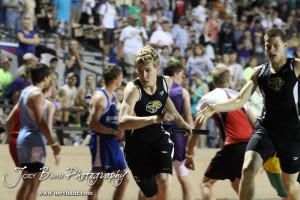 LaCrosse runners handoff the baton during the Boys 4x400 Meter Relay during the 2013 KSHSAA Class 1A Regional Track and Field competition at Lewis Field on the campus of Fort Hays State University in Hays, Kansas on May 17, 2013. (Photo: Joey Bahr, www.joeybahr.com)